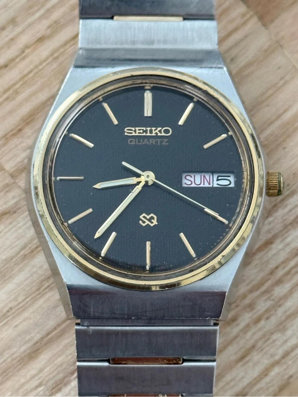 Seiko SQ Vintage Watch Gold Plated Bezel and Bracelet Black Dial Date Window